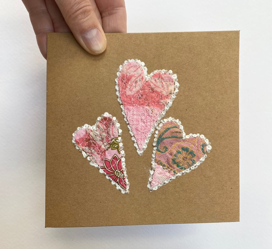 Up-cycled embroidered pink heart card. 