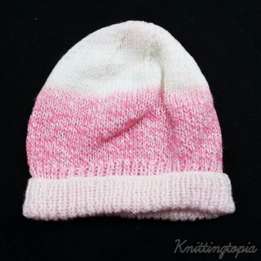 Hand knitted traditional baby beanie hat in pink and white 16 inch head