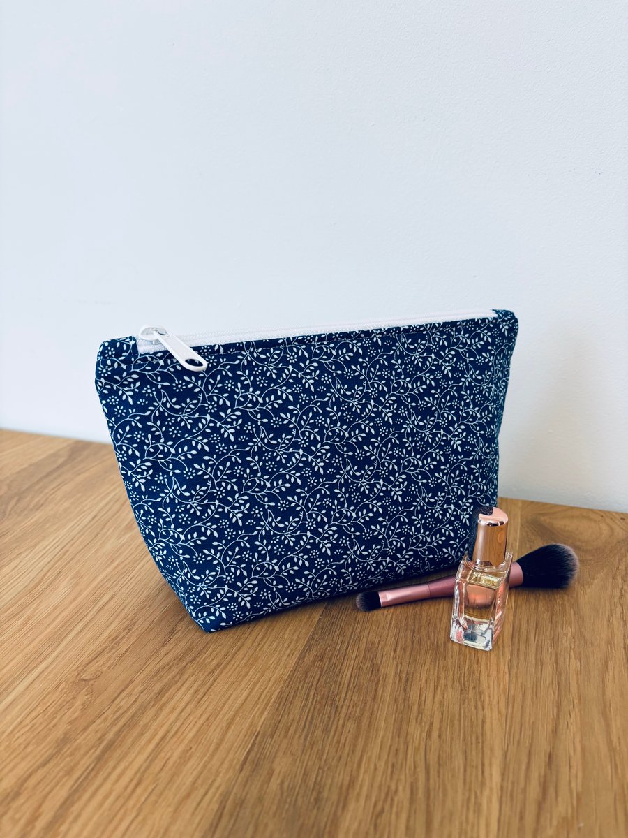 Make up bag, small toiletry bag, water resistant lining, in a blue floral design