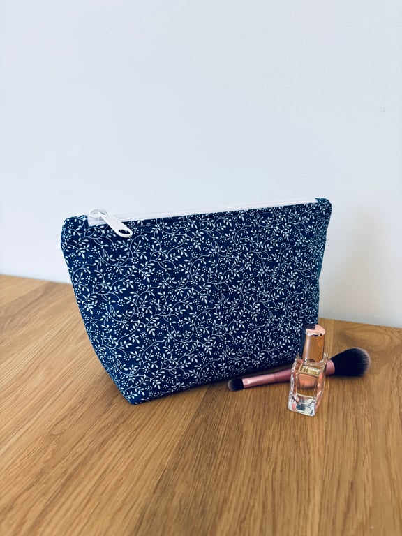 Make up bag, small toiletry bag, water resistant lining, in a blue floral design