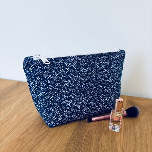 Make up bag, small toiletry bag, water resistant lining, in a blue floral design