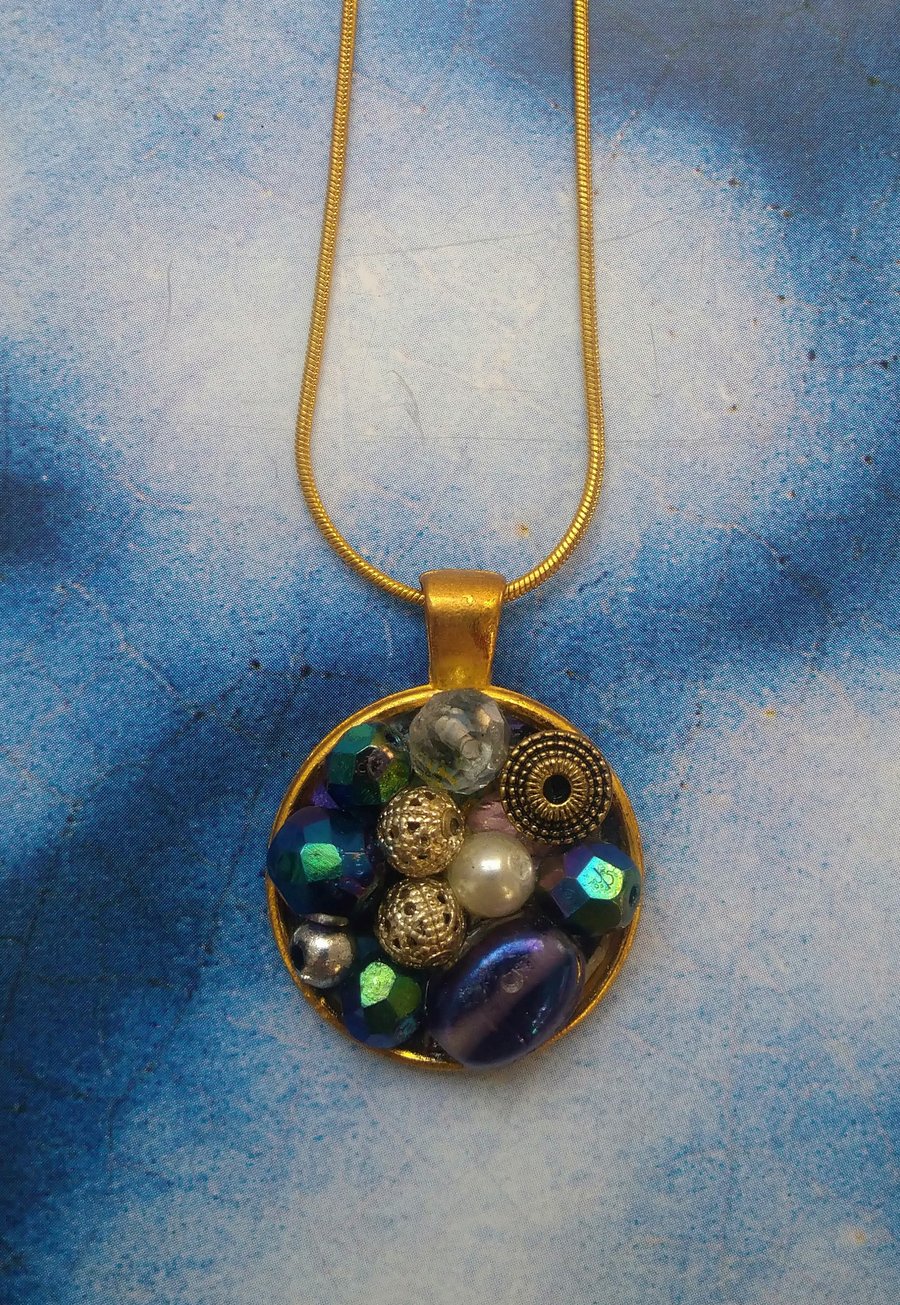 Iridescent Cluster of Gems and Beads in a Pendant