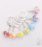 Lampwork Stitch Markers - Bright Rainbow Frit - Image 1