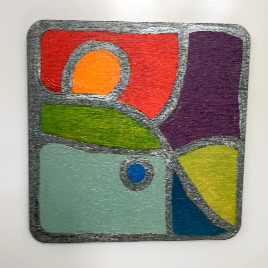 Stained glass effect. Hand painted wooden fridge magnets.