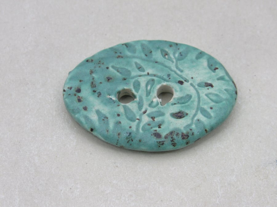 Large Eggshell Blue Sprig Oval Handmade Ceramic Button