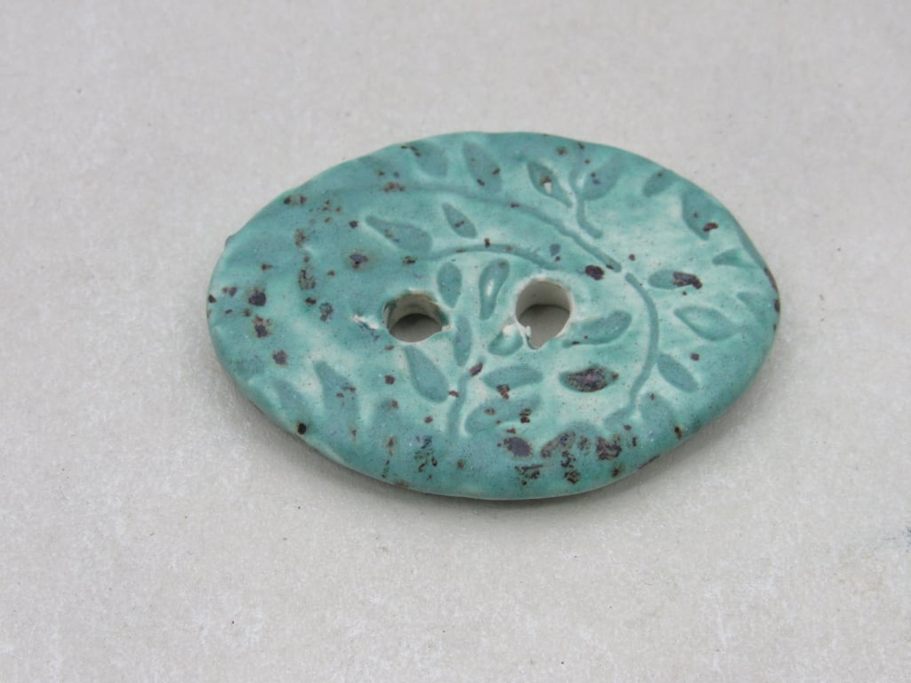 Large Eggshell Blue Sprig Oval Handmade Ceramic Button