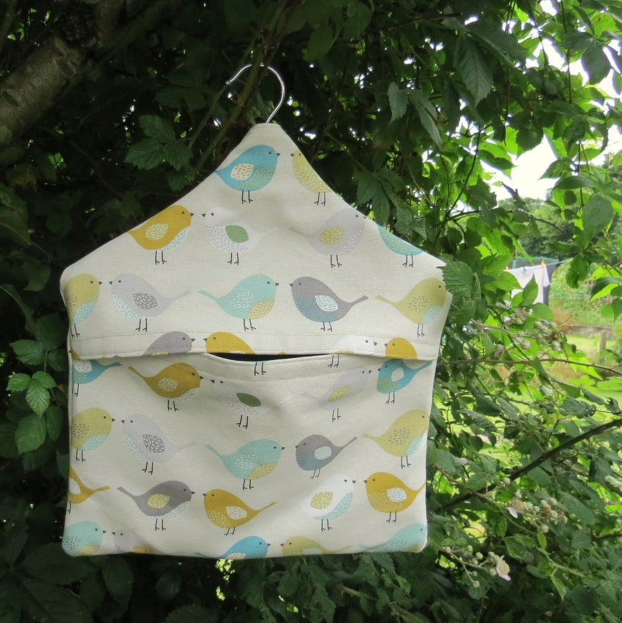 A peg bag with a Scandi bird design.