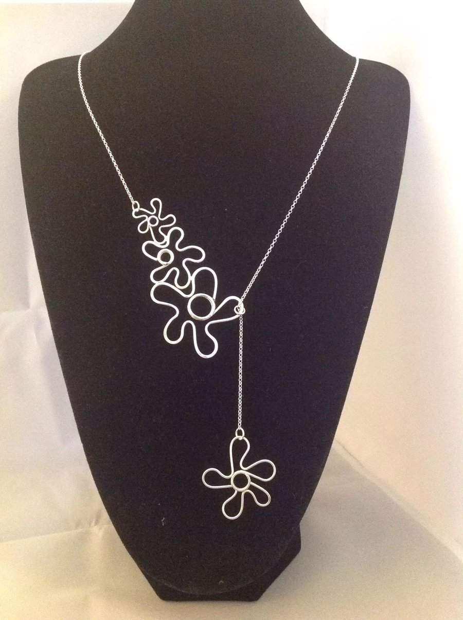 Three flower lariat necklace 