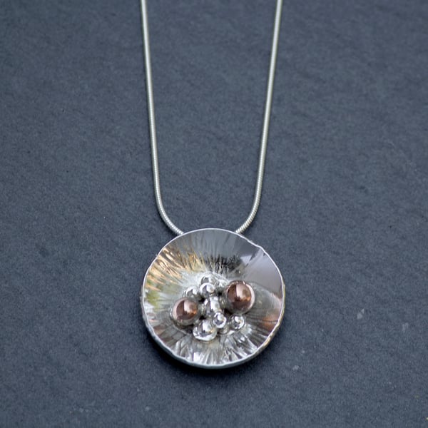 Silver and bronze granulated pendant