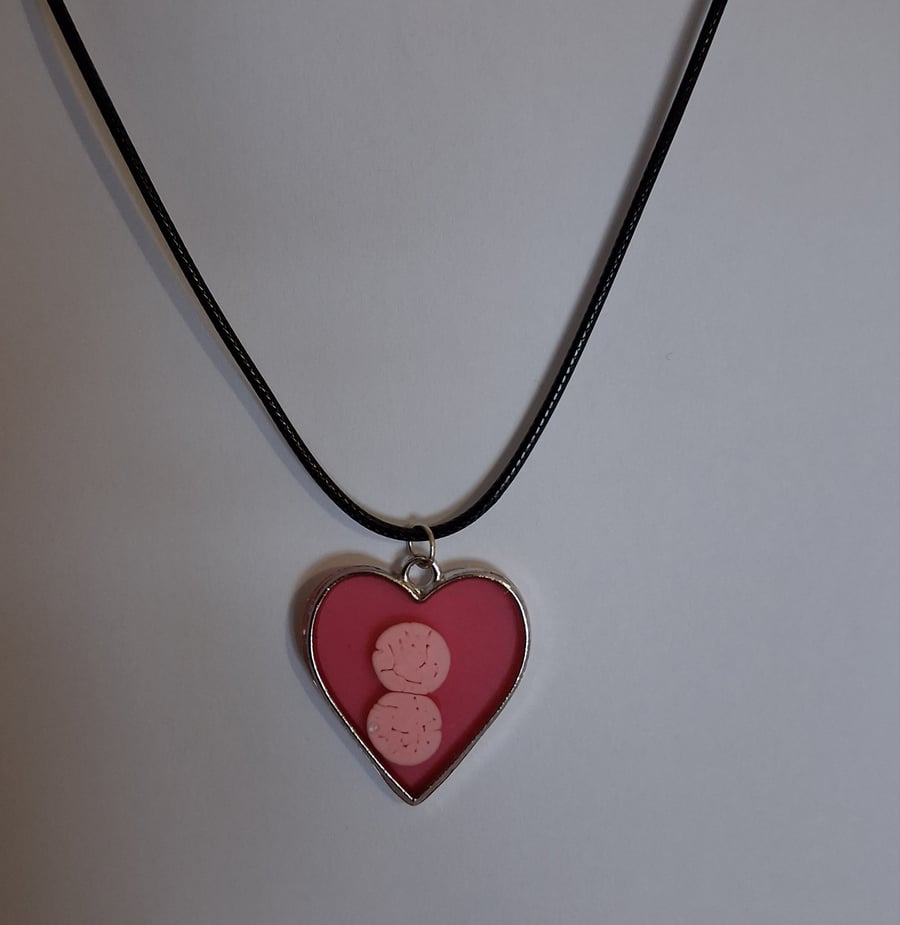 Handmade red pendant on black waxed cord