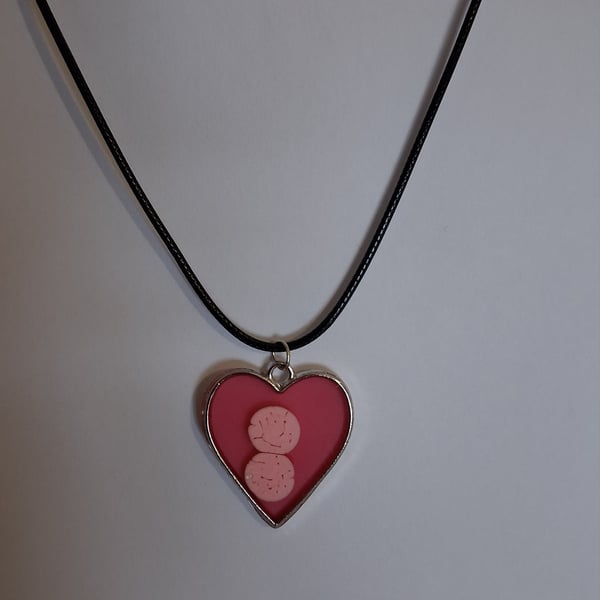 Handmade red pendant on black waxed cord