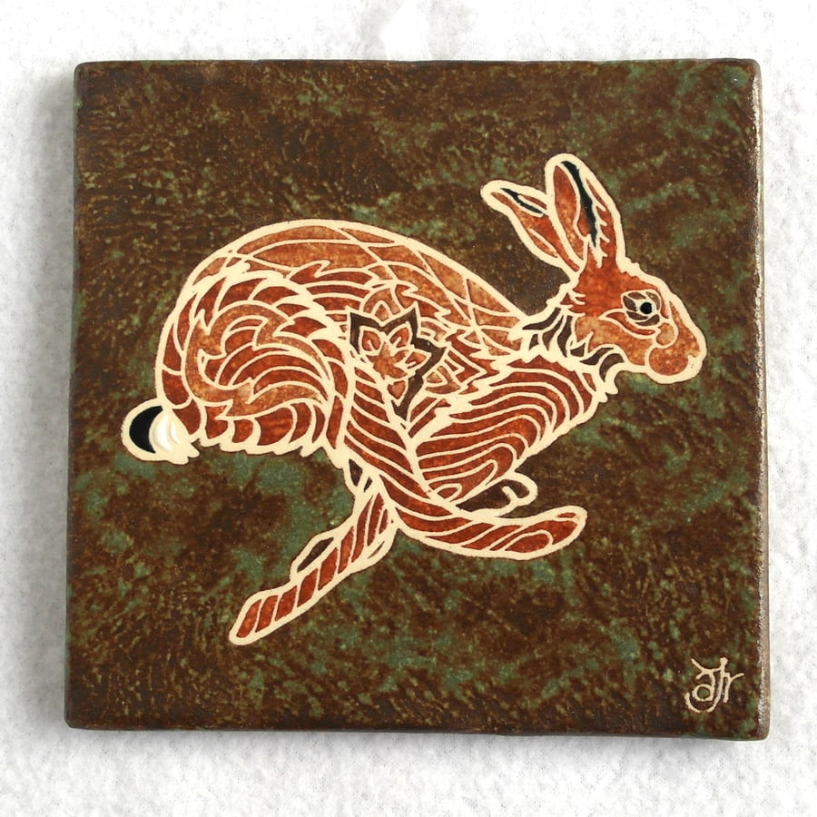 Wall plaque tile running hare picture