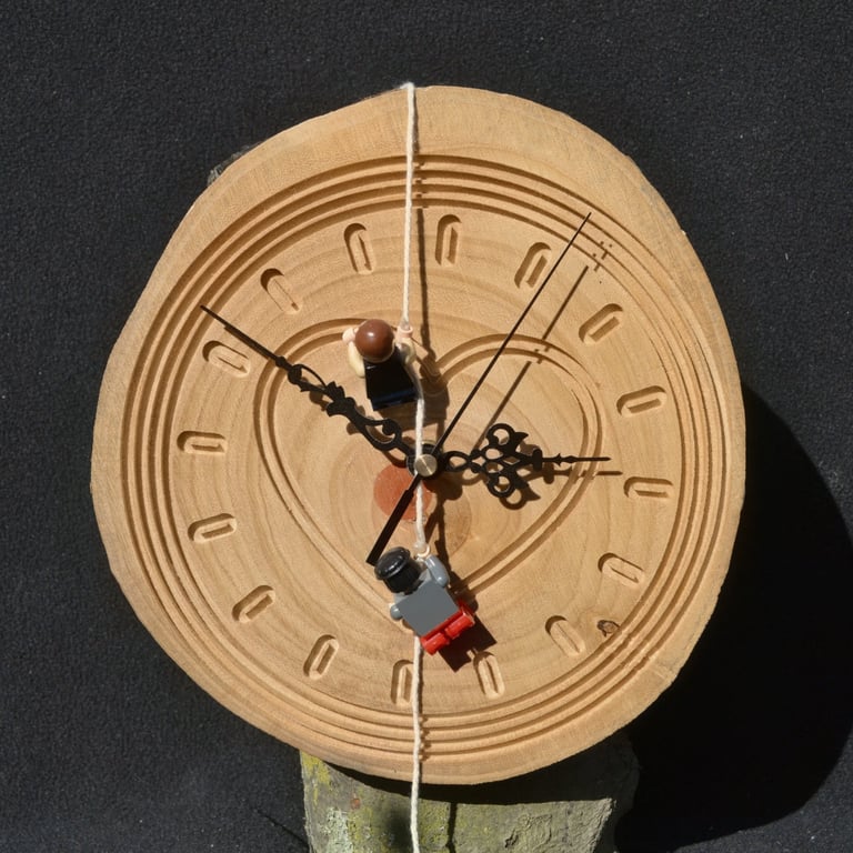 Handcrafted pine wall clock with quartz movement.
