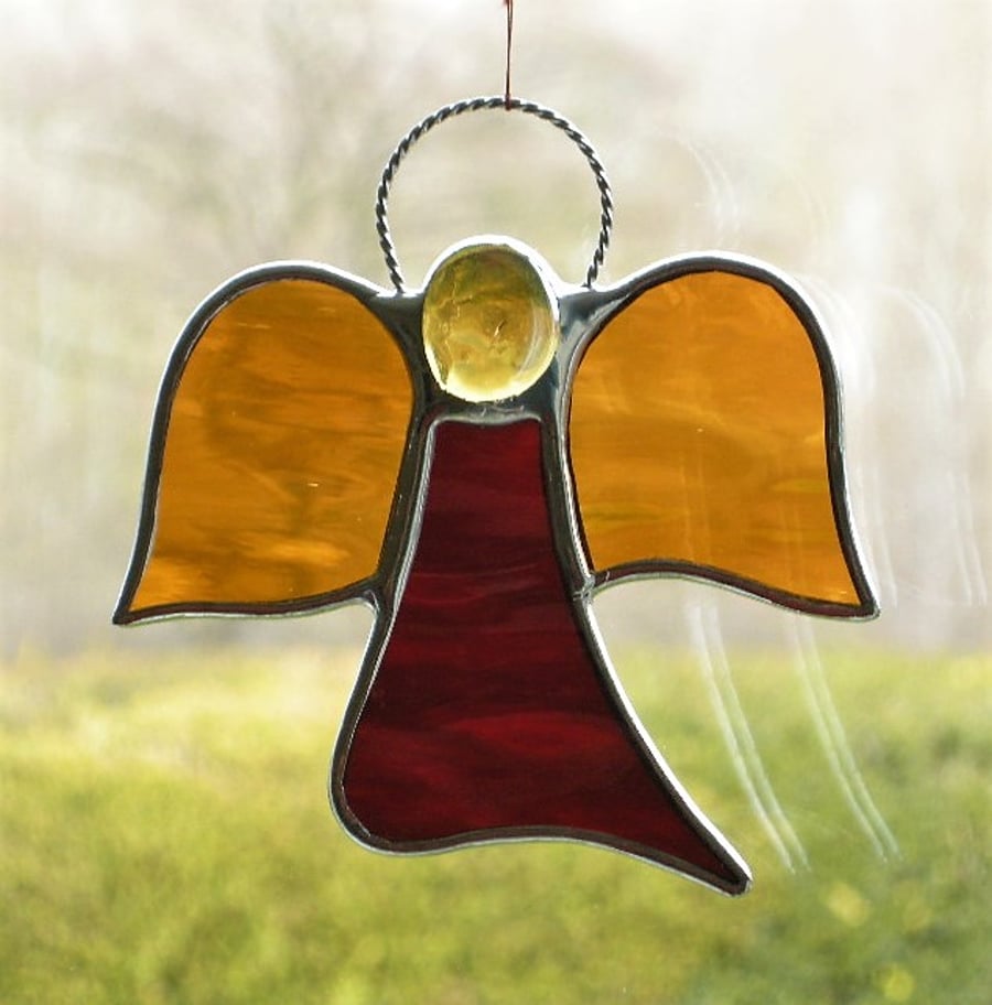 stained glass suncatcher Angel abstract in red and amber waterglass