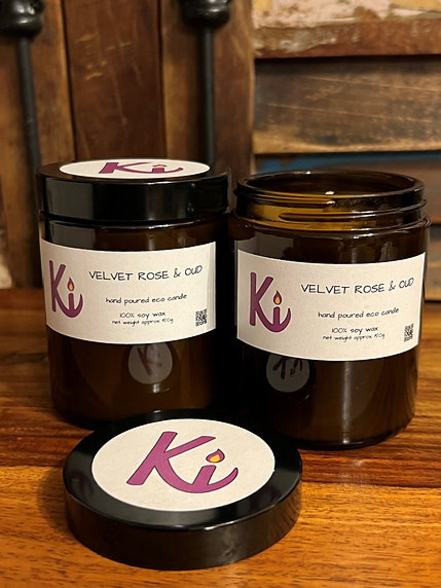 Velvet Rose & Oud scented soy candle in an apothecary jar