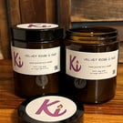 Velvet Rose & Oud scented soy candle in an apothecary jar