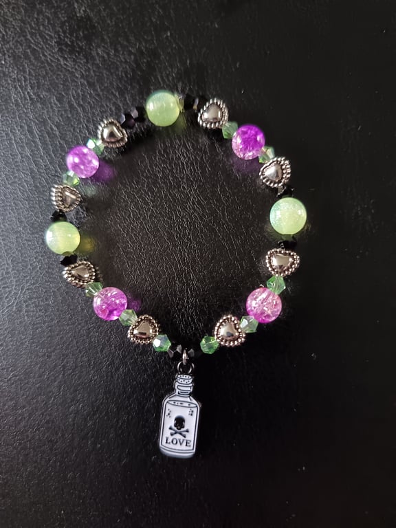 Elasticated potion bottle charm beaded bracelet 