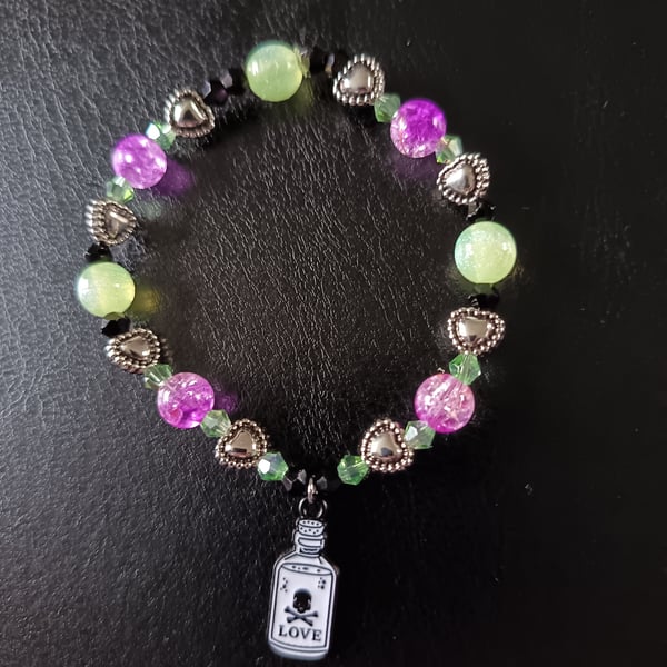 Elasticated potion bottle charm beaded bracelet 