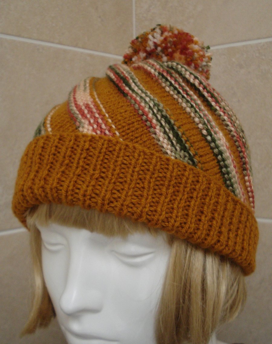 Hat With A twist Knitted In Ginger Orange Brown Greens And Pinks (J93)