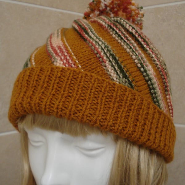 Hat With A twist Knitted In Ginger Orange Brown Greens And Pinks (J93)