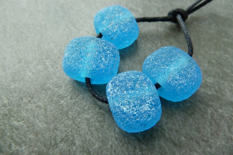 blue pitted lampwork glass beads