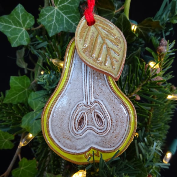 Pear slice with leaf pottery decoration