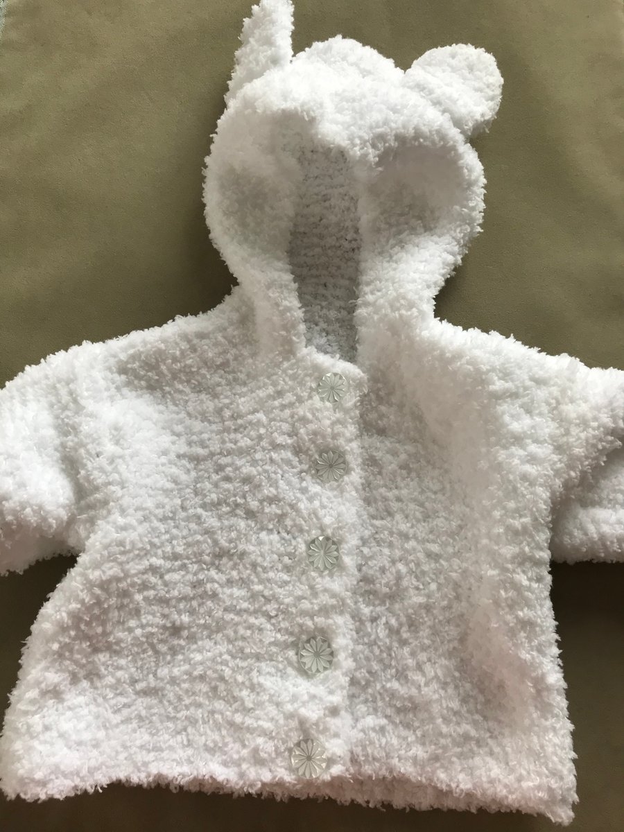 Fluffy baby jacket with hood