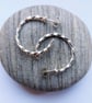 Sterling silver stud hoop earrings made from twisted square wire. - Image 1