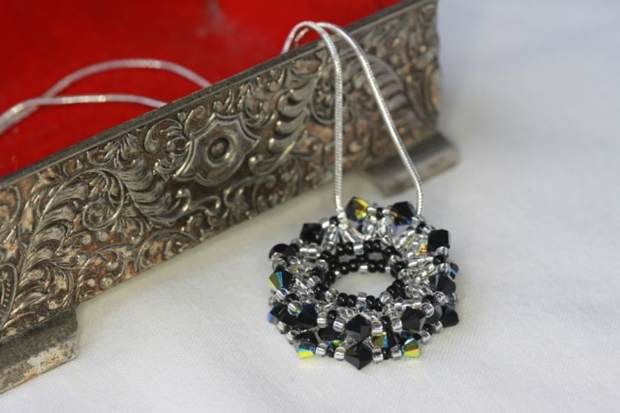 SALE: Black and Silver Beaded Wheel Pendant