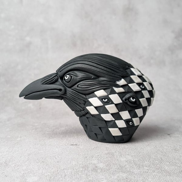 'Hailgrim', a black porcelain crow idol.