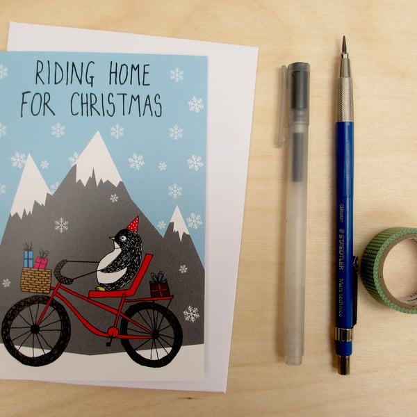 Riding home for Christmas penguin card