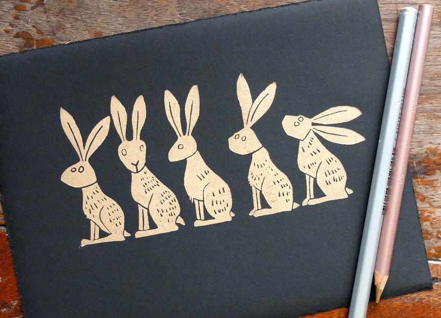 Line of Gold Hares - lino cut print