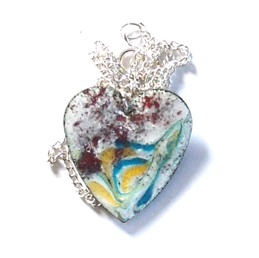 purple, yellow, blue, green scrolled on white - heart pendant