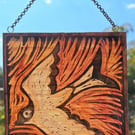SWALLOW SUNCATCHER WALL HANGING. HAND PAINTED BIRD. 4 x 4 inches.