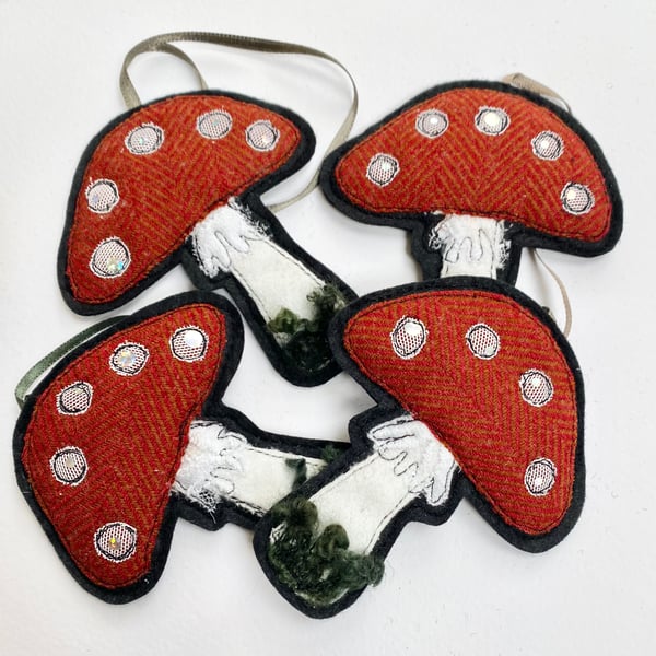 Upcycled embroidered woodland mushroom home decoration. 