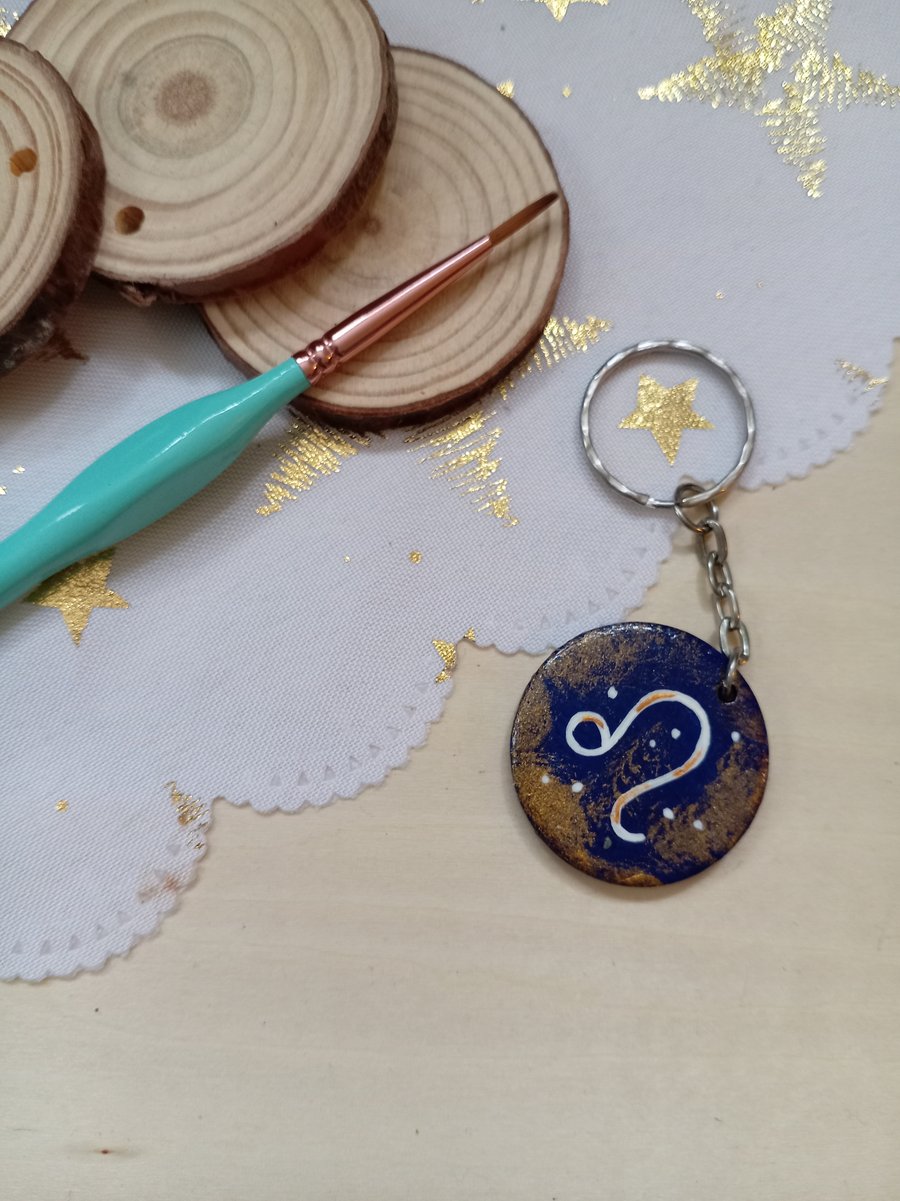 Wooden circular starsign Leo keyring