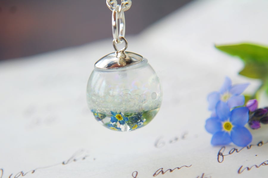 fairy necklace with magic bubbles and forget me not flowers