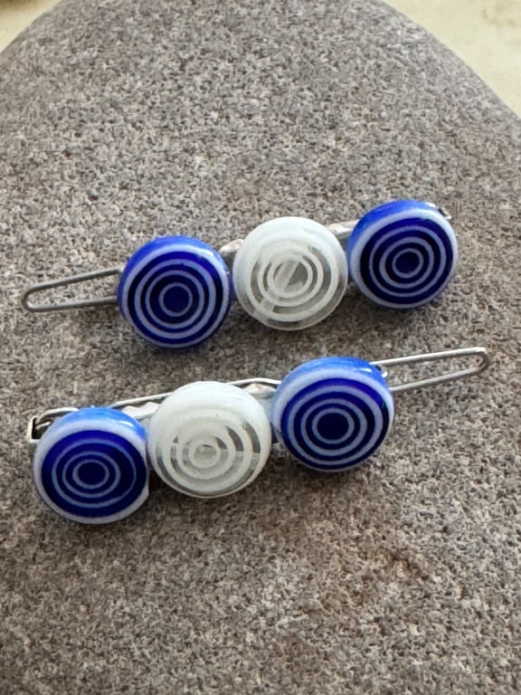 A pair of blue and white Pretty millefiori bead hair clips