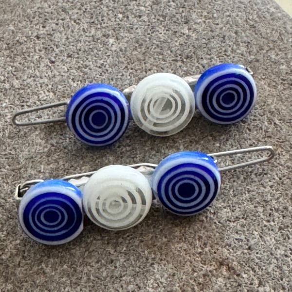 A pair of blue and white Pretty millefiori bead hair clips