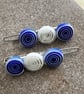 A pair of blue and white Pretty millefiori bead hair clips