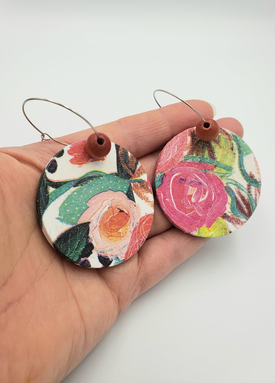 Floral patterned large dangly earrings in white, pink and green