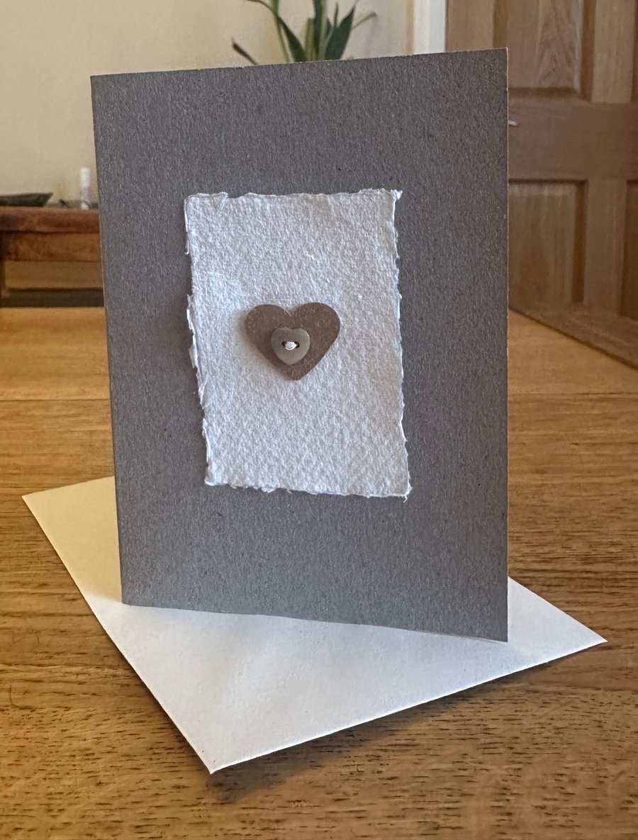 Heart motif card with heart shaped button 