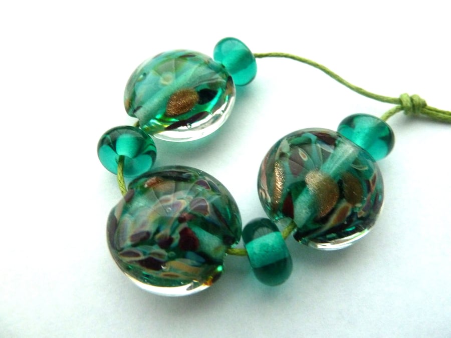 teal and goldstone beads