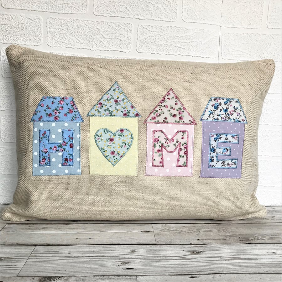 HOME applique rectangular cushion with pastel floral houses