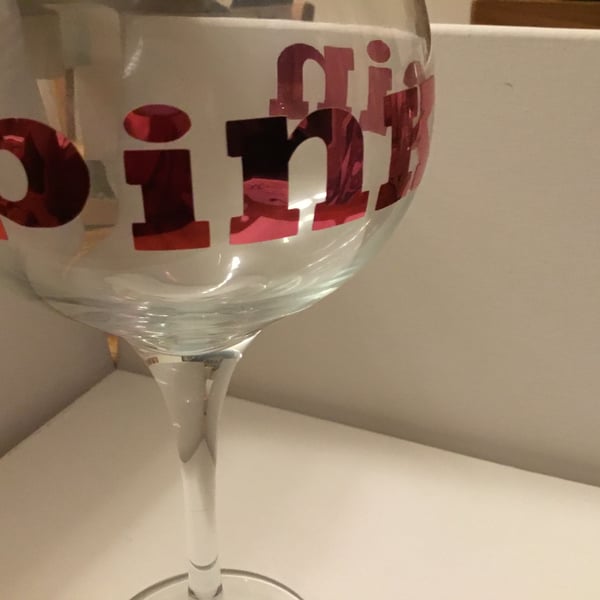 Gin glass. Pink gin glass