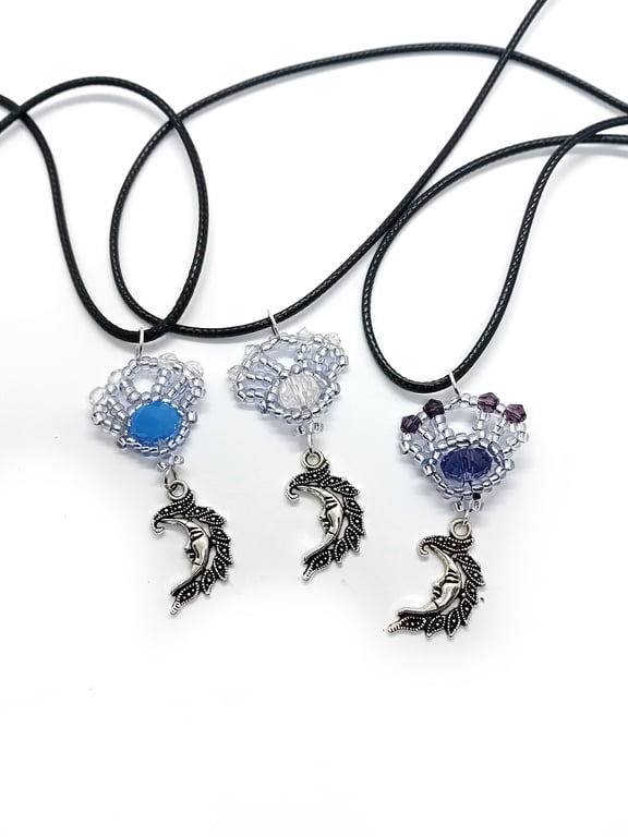 Blue and silver beaded motif and moon pendant necklace