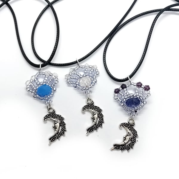 Blue and silver beaded motif and moon pendant necklace