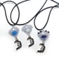Blue and silver beaded motif and moon pendant necklace
