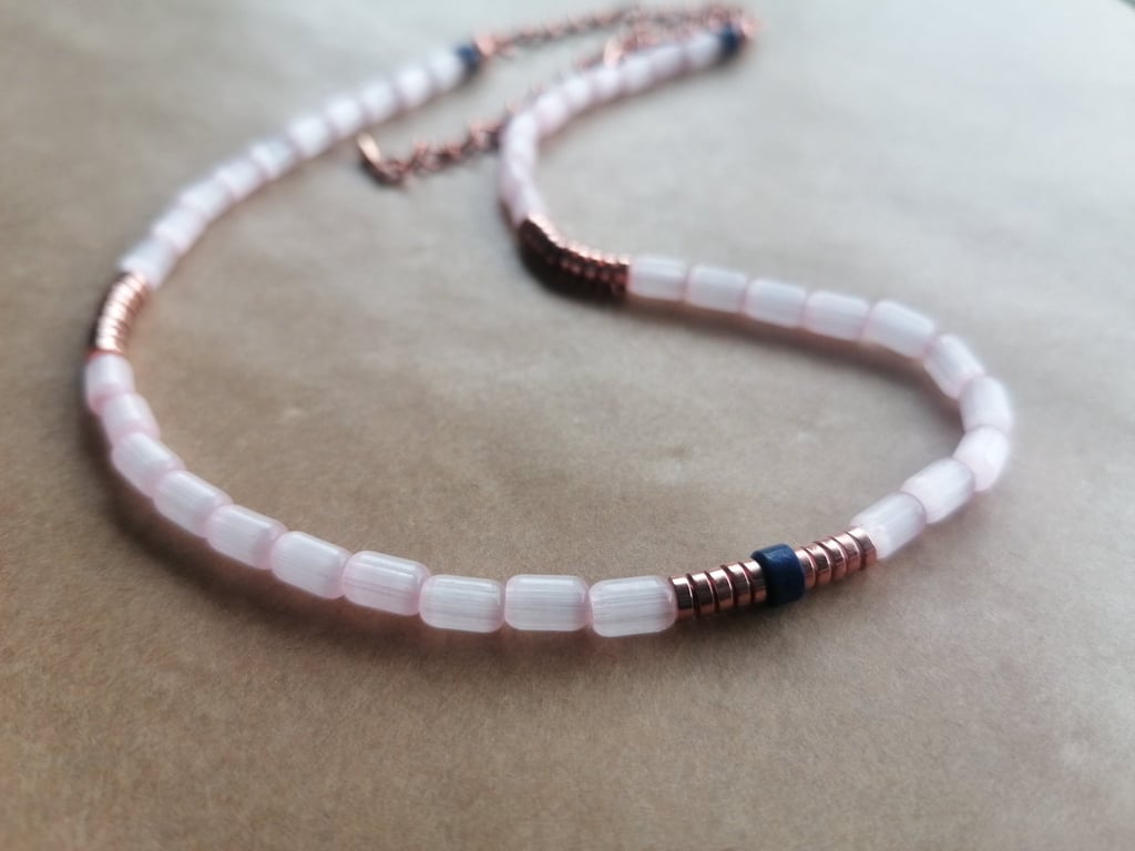 Pink rice bead necklace with Lapis Lazuli and Rose Gold Hematite discs. 