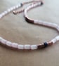Pink rice bead necklace with Lapis Lazuli and Rose Gold Hematite discs. 